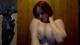 Topless and with long red hair :)